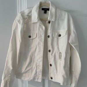 Ripped white jean jacket